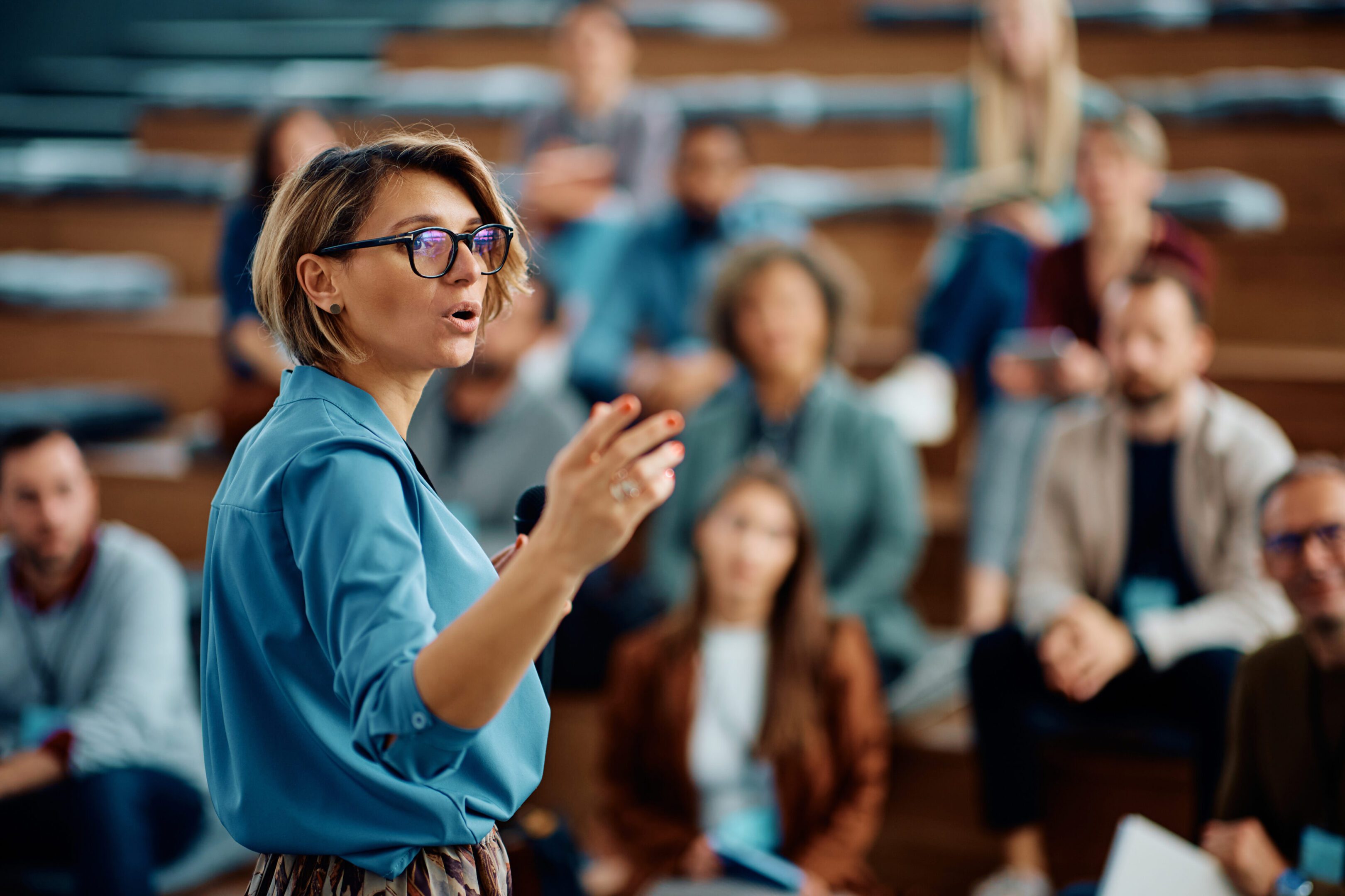 Lecturer engaging with diverse audience